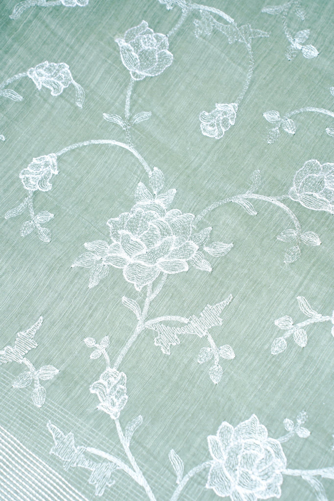 Sage Green Pure Linen Saree with White Chikankari Embroidery